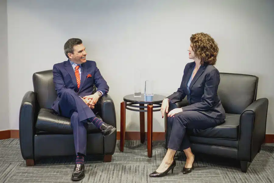 Downs & Stanford attorneys having a conversation